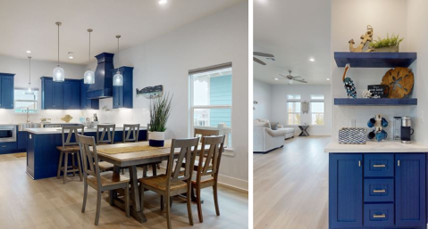 beautiful vacation rental kitchen, dining, and coffee bar with blue cabinets