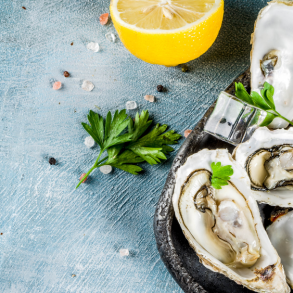 oysters on the half shell with lemon slices