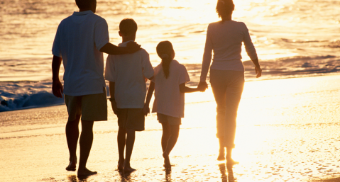 family walking on beach