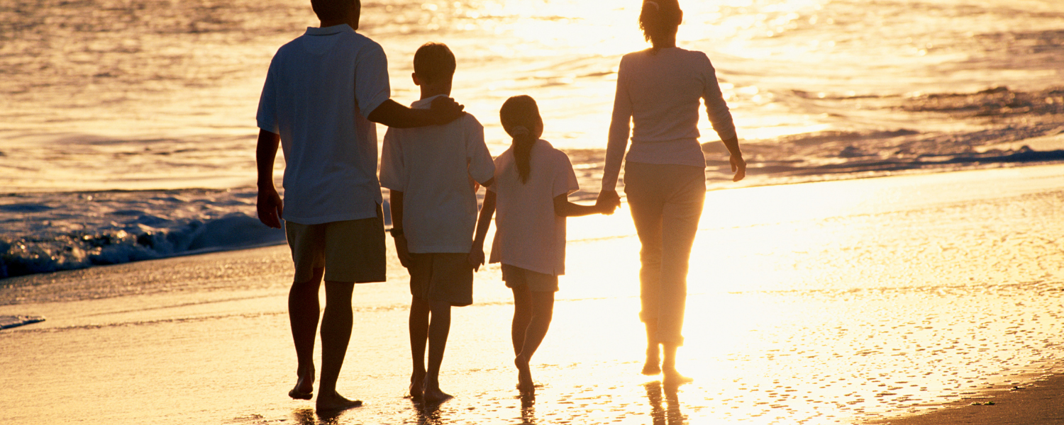 family walking on beach