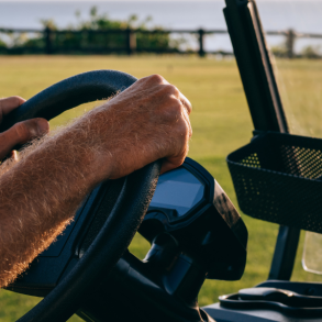 person in golf cart