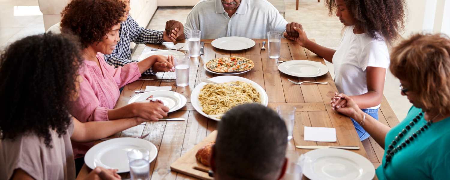 family gathered around dining table